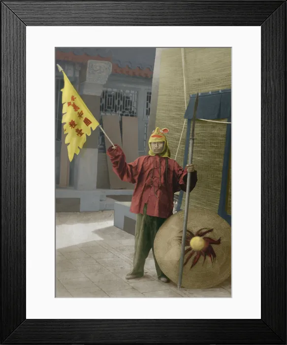 Framed Print : Chinese Boxer with shield and banner on urban street, c. 1900 Framed Print : Chinese Boxer with shield and banner on urban street, c. 1900