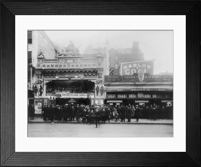 Framed Print : Movie theaters, Lust's Leader Theater, showing SHIPWRECKED AMONG CANNIBALS, Washington DC. photograph 1920