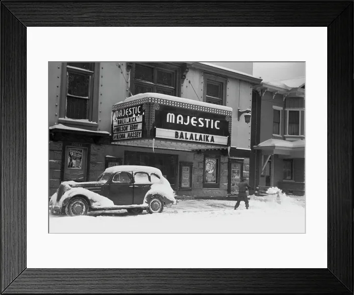 Framed Print : Shoveling snow away from the movie entrance of the Majestic theater, showing BALALAIKA, Chillicothe, Ohio, photograph by Arthur Rothstein, February, 1940