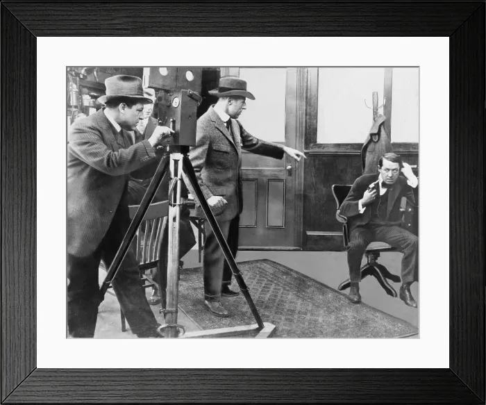 Framed Print : D.W. Griffith (1875-1948) directing Henry B. Walthall in 1914 film THE AVENGING CONSCIENCE with Billy Bitzer at the camera. ra. ra. ra