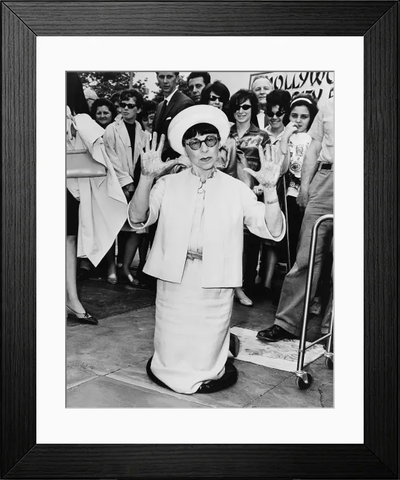 Framed Print : Edith Head, leaving hand prints in cement outside the Hollywood Pavilion in 1964. She won eight Academy Awards for her movie costume design Framed Print : Edith Head, leaving hand prints in cement outside the Hollywood Pavilion in 1964. She won eight Academy Awards for her movie costume design