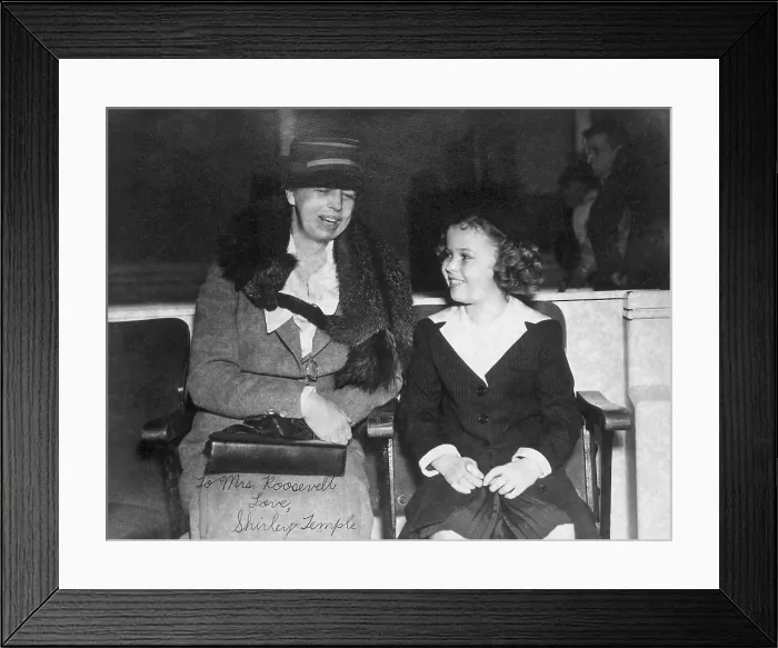 Framed Print : First Lady Eleanor Roosevelt and child star Shirley Temple. July 1938. The photo is autographed, To Mrs. Roosevelt, Love, Shirley Temple. (BSLOC_2013_5_213)