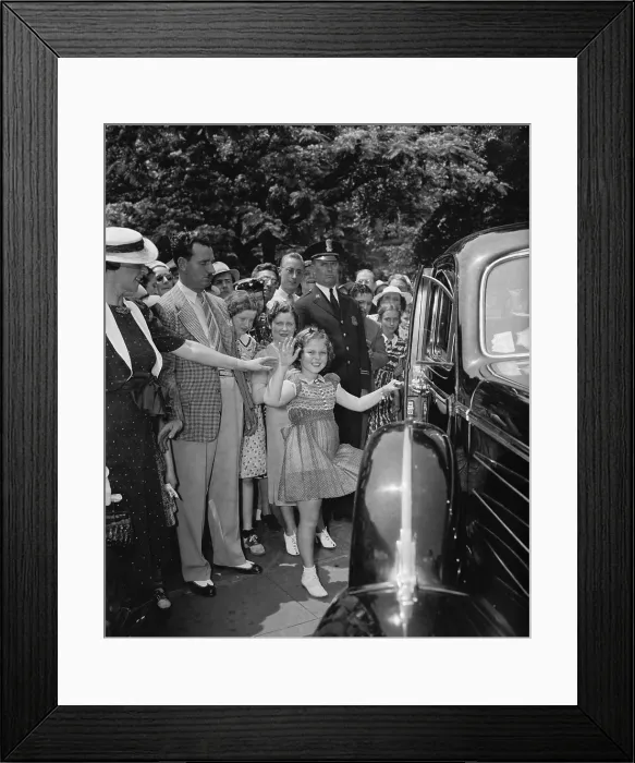 Framed Print : Shirley Temple leaving the White House after a visit to President Franklin Roosevelt. June 24, 1938. (BSLOC_2013_9_16) Framed Print : Shirley Temple leaving the White House after a visit to President Franklin Roosevelt. June 24, 1938. (BSLOC_2013_9_16)