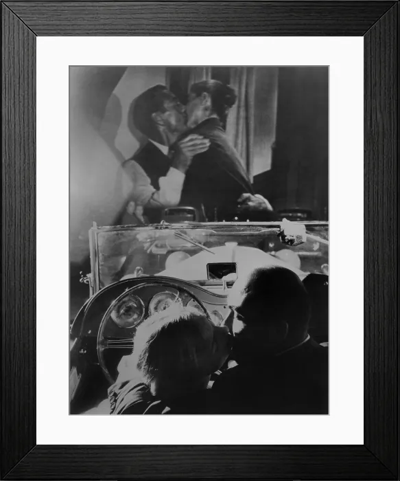 Framed Print : Couple kissing at drive-in theater in Rome, Italy, Sept. 1957. On screen Gary Cooper and Audrey Hepburn are likewise engaged. (BSLOC_2015_14_176)