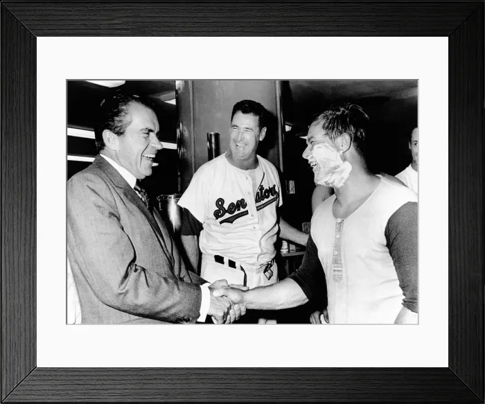 Framed Print : President Richard Nixon greets Washington Senators Catcher Jim French after their win over the Brewers. Manager Ted Williams is in center. July 7, 1970