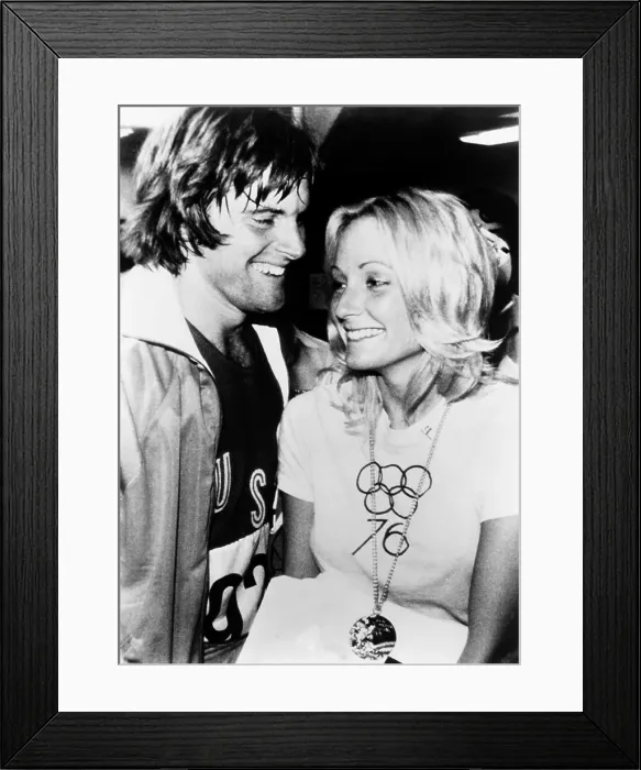 Framed Print : Bruce Jenner with wife Chrystie Crownover who wears his Olympic Gold Medal. A few months earlier he won the decathlon in the 1976 Summer Olympic Games in Montreal. Sept. 1976