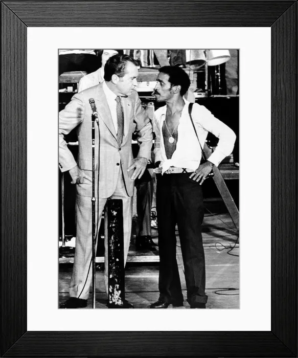 Framed Print : President Richard Nixon and comedian Sammy Davis, Jr. on stage at Miami's Marine Stadium. Davis, a long-time Democrat, switched his allegiance to Nixon. June 23, 1972