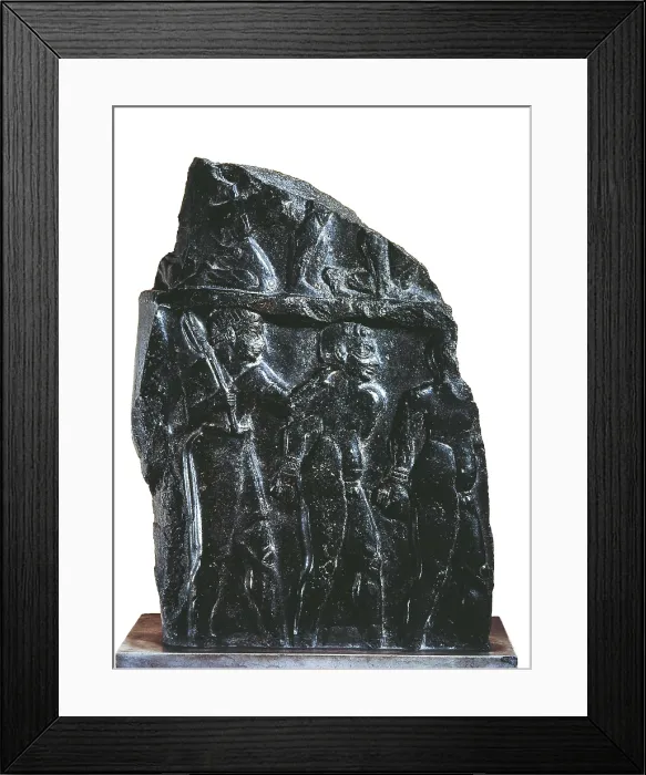 Framed Print : Shard of a Victory Stele of a King of Akkad. c. 2300 BC. Victory stela that shows an Akkadian soldier escorting naked prisoners. Fragment. Akkadian art. Relief on rock. FRANCE Framed Print : Shard of a Victory Stele of a King of Akkad. c. 2300 BC. Victory stela that shows an Akkadian soldier escorting naked prisoners. Fragment. Akkadian art. Relief on rock. FRANCE
