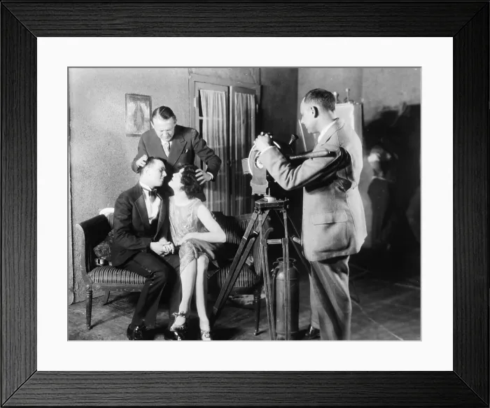 Framed Print : MGM director Edmund Goulding (back left), helping William Twiddy (left), and Bill Easton, kiss on set, while making a film with the motion picture class at Columbia University Framed Print : MGM director Edmund Goulding (back left), helping William Twiddy (left), and Bill Easton, kiss on set, while making a film with the motion picture class at Columbia University