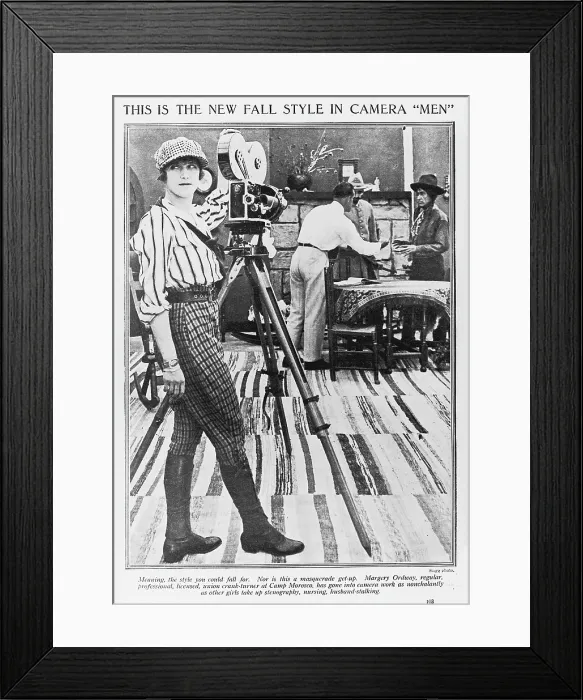 Framed Print : Margery Ordway, woman cinematographer, text reads This is the new Fall style in camera men, Meaning, the style you could fall for. Nor is this a masquerade get-up