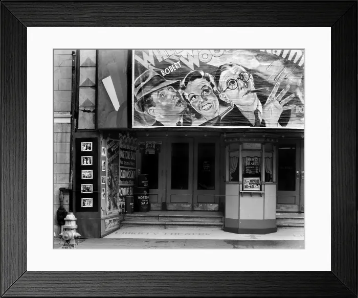 Framed Print : Movie theater on Saint Charles Street, Liberty Theater, showing THE RAINMAKERS, with Bert Wheeler, Dorothy Lee, Robert Woolsey, New Orleans, Louisiana, photograph by Walker Evans