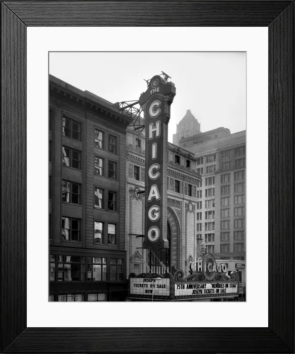 Framed Print : The Chicago Theater, constructed in 1921, photograph shows the sign and the Page Brothers building to the right, 175 North State Street, Chicago, Illinois, circa 1990s