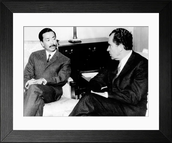 Framed Print : President Richard Nixon talks with South Vietnamese Vice President Nguyen Cao Ky in Paris. In their private meeting they discussed progress in the Vietnam peace talk