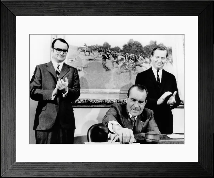 Framed Print : President Richard Nixon signs far reaching anti-pollution legislation. It will require the auto industry to produce virtually emission free cars by 1976 Framed Print : President Richard Nixon signs far reaching anti-pollution legislation. It will require the auto industry to produce virtually emission free cars by 1976
