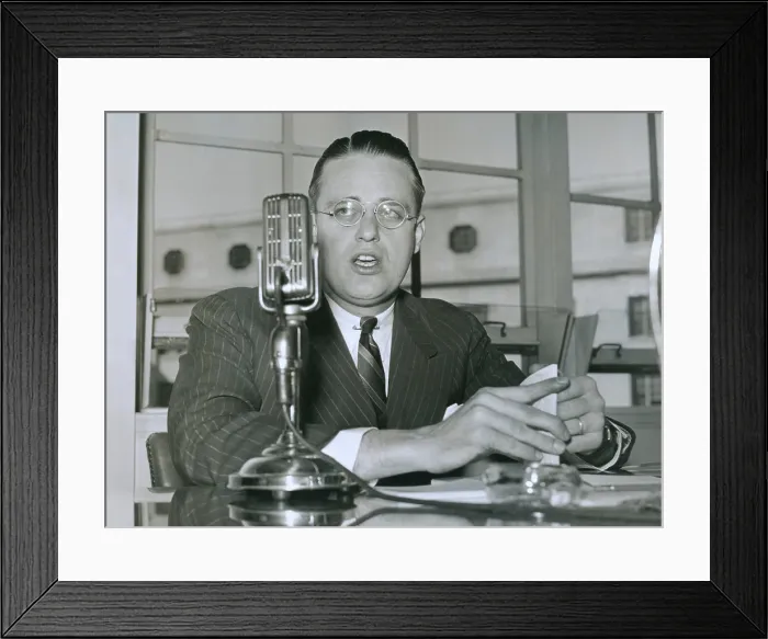 Framed Print : Elliott Roosevelt, testifies at FCC hearing. He represented the Texas State Network, an organization of Broadcasting stations, as he testified on March 7, 1939