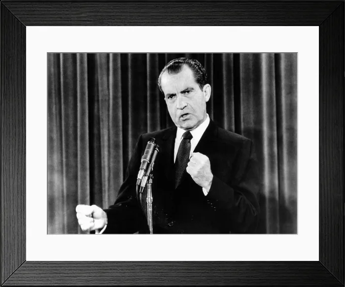 Framed Print : President Richard Nixon during a news conference. He predicted the Vietnam War would be concluded regardless of what happened in the Paris Peace talks. Dec. 8, 1969