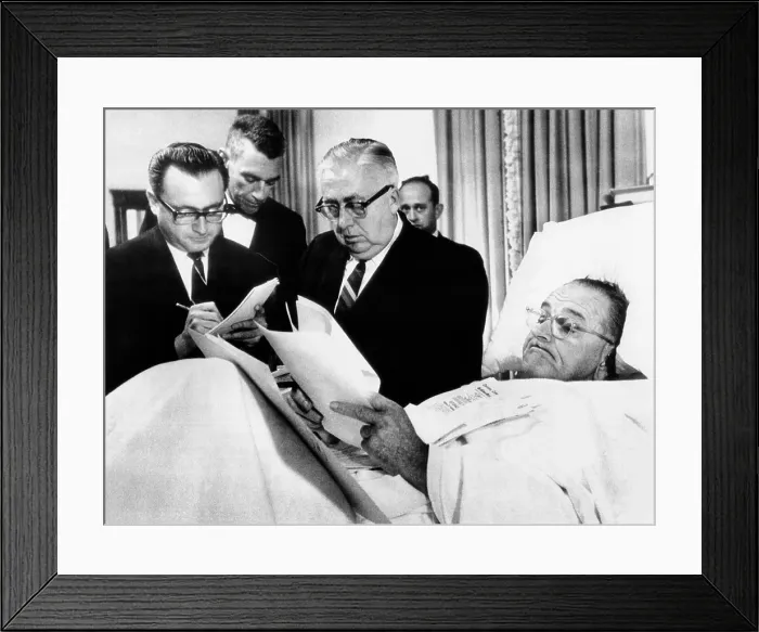 Framed Print : President Lyndon Johnson working in bed after gall bladder surgery. President Johnson looks over documents in his hospital bed at Bethesda Naval Hospital as newsmen look on. Nov Framed Print : President Lyndon Johnson working in bed after gall bladder surgery. President Johnson looks over documents in his hospital bed at Bethesda Naval Hospital as newsmen look on. Nov