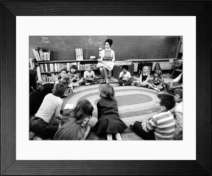 Framed Print : Julie Nixon Eisenhower with first graders at Edgewater Elementary School. President Nixon's daughter worked as a teacher while living in the White House. Sept. 27, 1972