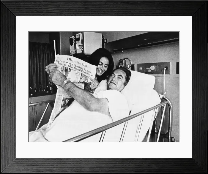Framed Print : Alabama Governor George Wallace and his wife, Cornelia, hold up newspaper with headline Wallace wins in Maryland, Michigan, Democratic Presidential primaries Framed Print : Alabama Governor George Wallace and his wife, Cornelia, hold up newspaper with headline Wallace wins in Maryland, Michigan, Democratic Presidential primaries