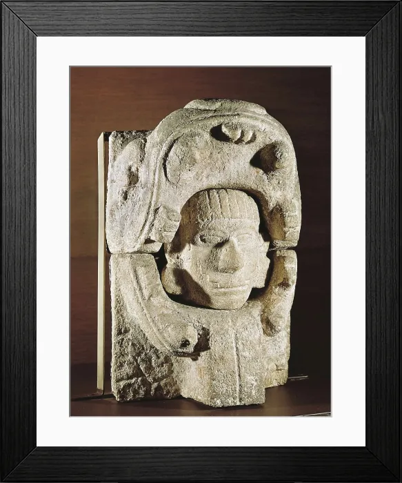 Framed Print : Human head going out from animal's jaws. 950-1200. Late classical period. Clay. Maya art. Sculpture on rock. MEXICO. Mexico City. National Museum of Anthropology