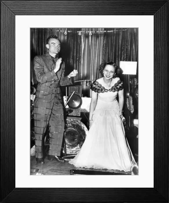 Framed Print : The President's daughter, Margaret Truman takes a bow. She sang with Spike Jones orchestra at the 25th annual dinner of the White House Correspondents Association