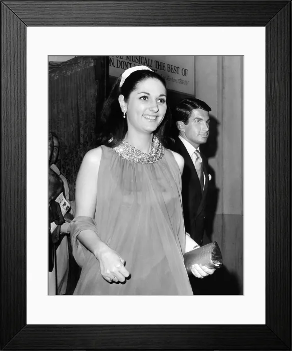 Framed Print : Lynda Bird Johnson, escorted by actor George Hamilton after seeing the Broadway Mame. The President's daughter is working as a magazine writer in New York City Framed Print : Lynda Bird Johnson, escorted by actor George Hamilton after seeing the Broadway Mame. The President's daughter is working as a magazine writer in New York City