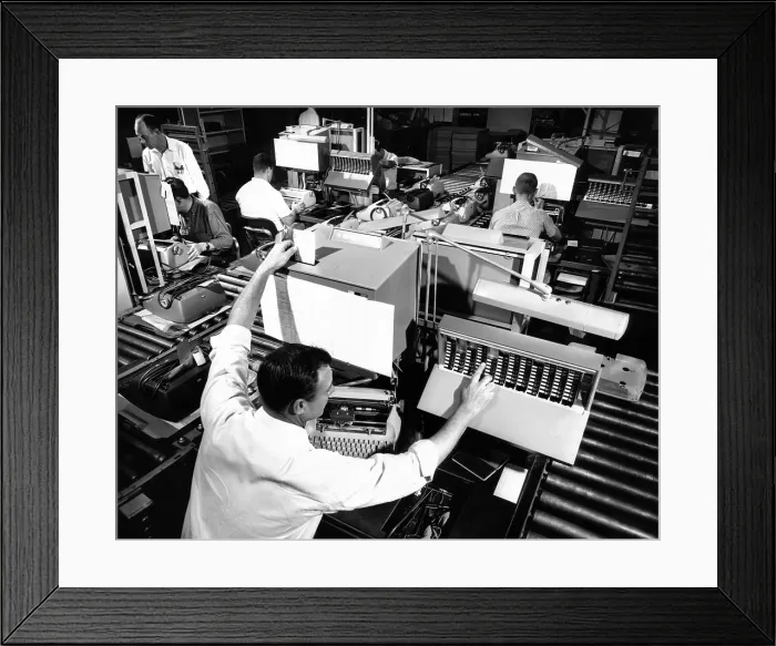 Framed Print : The assembly line at IBM's Lexington, Kentucky, typewriter plant. Each inspector reports typewriter defects to the central processor