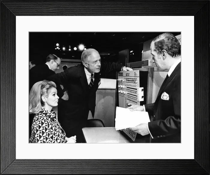 Framed Print : Thomas J. Watson, Jr. talks with IBM stockholders before their yearly meeting in the New York Coliseum. The IBM system / 360 40 model was on display. April 24, 1967 Framed Print : Thomas J. Watson, Jr. talks with IBM stockholders before their yearly meeting in the New York Coliseum. The IBM system / 360 40 model was on display. April 24, 1967
