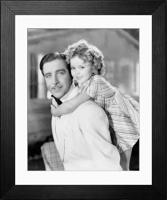 Framed Print : CURLY TOP, John Boles, Shirley Temple, 1935, TM and copyright Fox Film Corp. All rights reserved  /  Courtesy: Everett Collection