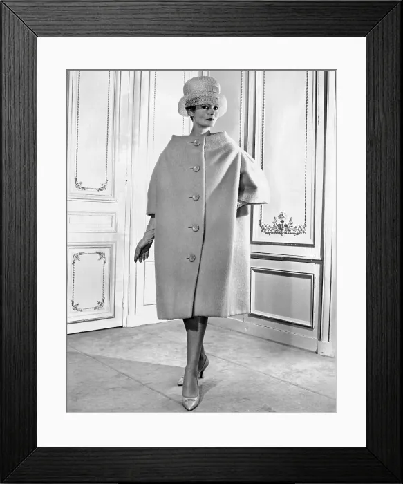 Framed Print : Pierre Cardin women's voluminous coat. It has simple lines, falling from the shoulders over the body, like a tent. Feb. 1959. (CSU_ALPHA_1303) CSU Archives / Everett Collection