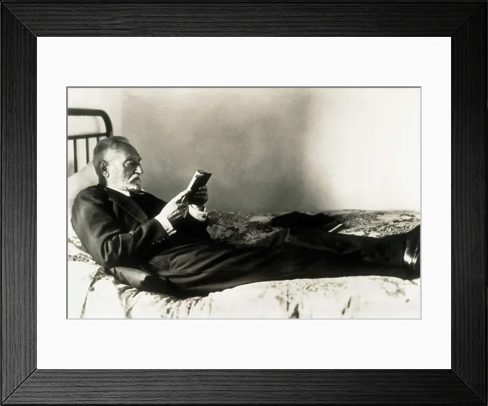 Framed Print : UNAMUNO, Miguel de (1864-1936). Miguel de Unamuno reads lying on the bed. AISA / Everett Collection**US SALES ONLY** Framed Print : UNAMUNO, Miguel de (1864-1936). Miguel de Unamuno reads lying on the bed. AISA / Everett Collection**US SALES ONLY**