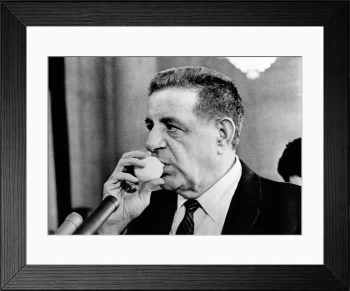 Framed Print : Joseph Valachi sucking a lemon juice container during Senate Investigations Subcommittee. The juice eased his hoarseness from continuous testimony. Oct. 2, 1963 Framed Print : Joseph Valachi sucking a lemon juice container during Senate Investigations Subcommittee. The juice eased his hoarseness from continuous testimony. Oct. 2, 1963
