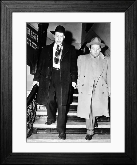 Framed Print : Anthony Anastasia (right) after his arrest by immigration authorities on charges of entering the country illegally Framed Print : Anthony Anastasia (right) after his arrest by immigration authorities on charges of entering the country illegally