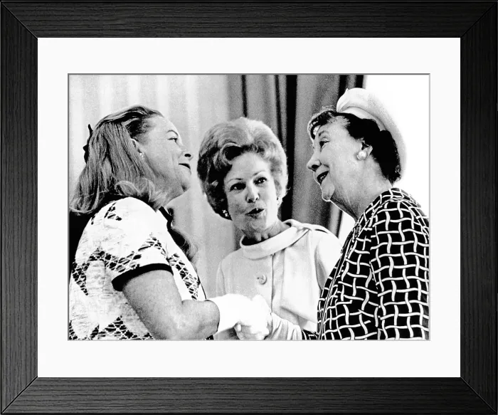 Framed Print : Pat Nixon, introduces Martha Mitchell (left), the flamboyant wife of the Attorney General, to Mamie Eisenhower at a White House reception for Senate wives. May 22, 1970