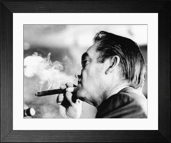 Framed Print : Alabama Gov. George Wallace puffs on a cigar. He was at the National Governors Conference listening to a speech by Vice President Spiro Agnew. Feb. 23, 1972 Framed Print : Alabama Gov. George Wallace puffs on a cigar. He was at the National Governors Conference listening to a speech by Vice President Spiro Agnew. Feb. 23, 1972