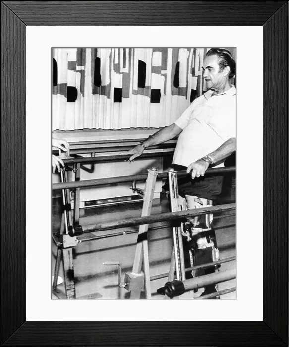 Framed Print : Gov. George Wallace walks in rehabilitation with the assistance of leg braces and parallel bars Framed Print : Gov. George Wallace walks in rehabilitation with the assistance of leg braces and parallel bars