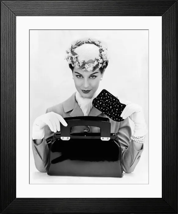 Framed Print : Women's accessories include a square cut, top opening, black patent leather purse
