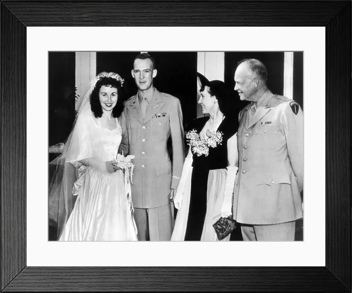 Framed Print : Eisenhower Wedding Reception. Capt. John Eisenhower and his new bride, the former Barbara Thompson, at the Hampton, Virginia, Beach Club with his parents, Gen