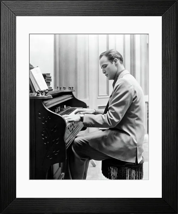 Framed Print : GUYS AND DOLLS, Marlon Brando, 1955, piano Framed Print : GUYS AND DOLLS, Marlon Brando, 1955, piano