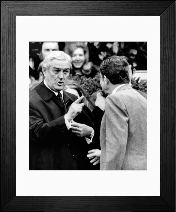 Framed Print : President Richard Nixon listens to an animated John Connally, Treasury Secy, as he embarks on his historic trip to China, Feb. 17, 1972