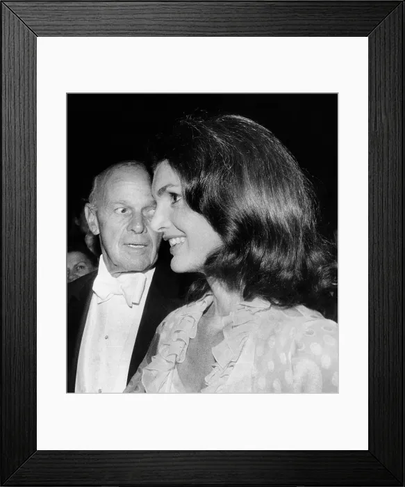 Framed Print : Jacqueline Kennedy Onassis with George Moore, of the Metropolitan Opera Association. They attended a gala performance of ballet and opera honoring impresario, Sol Hurok
