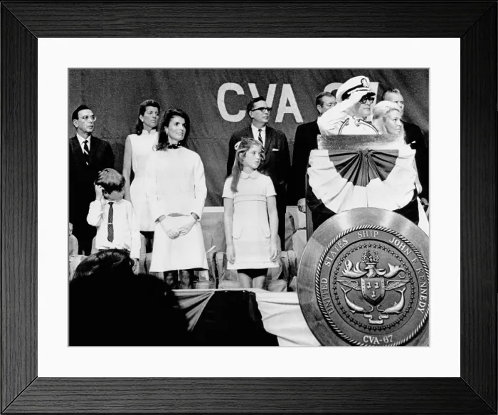 Framed Print : Captain Earl Yates (on right, saluting), the commanding officer of the new aircraft carrier USS John F. Kennedy during the commissioning ceremonies Framed Print : Captain Earl Yates (on right, saluting), the commanding officer of the new aircraft carrier USS John F. Kennedy during the commissioning ceremonies