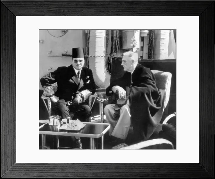 Framed Print : President Franklin Roosevelt meets with King Farouk of Egypt aboard a U.S. war ship anchored in Great Bitter Lake near Cairo. Feb. 20, 1945 Framed Print : President Franklin Roosevelt meets with King Farouk of Egypt aboard a U.S. war ship anchored in Great Bitter Lake near Cairo. Feb. 20, 1945