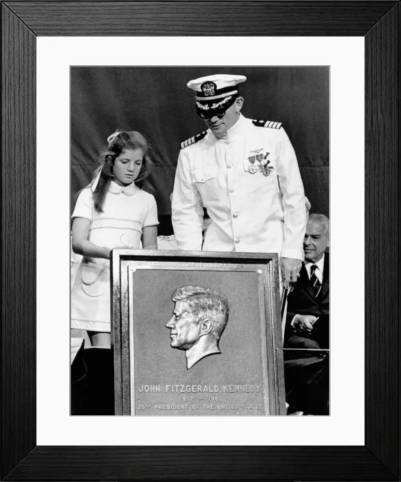 Framed Print : Caroline Kennedy with Capt. Earl Yates, commander of the newly commissioned aircraft carrier, USS John F. Kennedy Framed Print : Caroline Kennedy with Capt. Earl Yates, commander of the newly commissioned aircraft carrier, USS John F. Kennedy