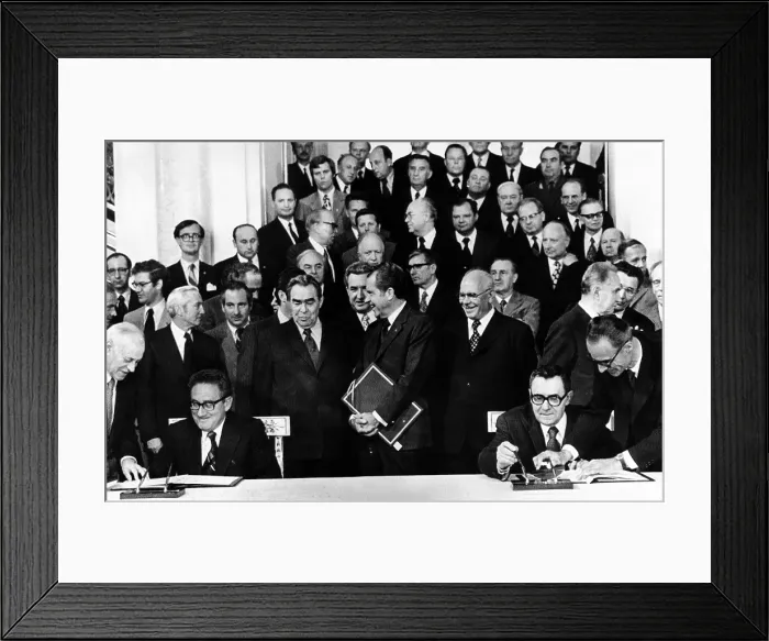 Framed Print : Secretary of State Henry Kissinger (seated left) and Soviet Foreign Minister Andrei Gromyko sign an scientific agreement at the Kremlin