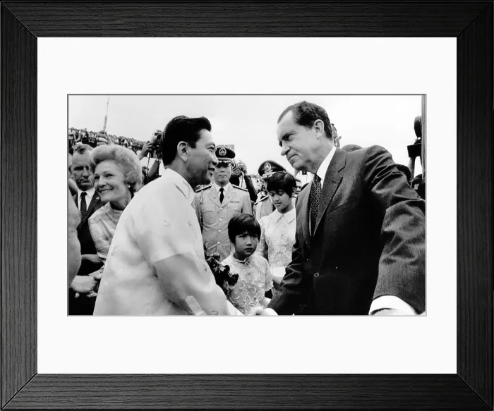 Framed Print : President Richard Nixon is greeted by President Ferdinand Marcos. The Philippines was the first stop of Nixon's seven nation world tour. July 26, 1969