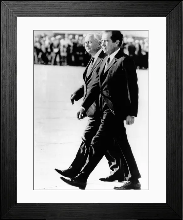 Framed Print : President Richard Nixon and British Prime Minister Harold Wilson walk in step. They were reviewing an honor guard upon Nixon's arrival at Mindenhall Air Force Base, England Framed Print : President Richard Nixon and British Prime Minister Harold Wilson walk in step. They were reviewing an honor guard upon Nixon's arrival at Mindenhall Air Force Base, England