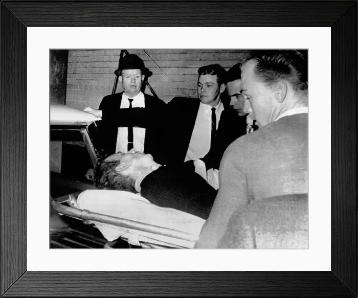 Framed Print : Dying assassin Lee Harvey Oswald is placed in ambulance after he was shot by Jack Ruby, in the Dallas Police Station Framed Print : Dying assassin Lee Harvey Oswald is placed in ambulance after he was shot by Jack Ruby, in the Dallas Police Station