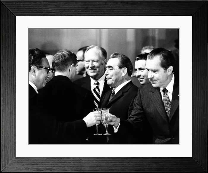 Framed Print : President Richard Nixon and Henry Kissinger clink champagne glasses to toast after signing of a Strategic Arms Limitation agreement with Soviet leaders. Just behind them are Secy