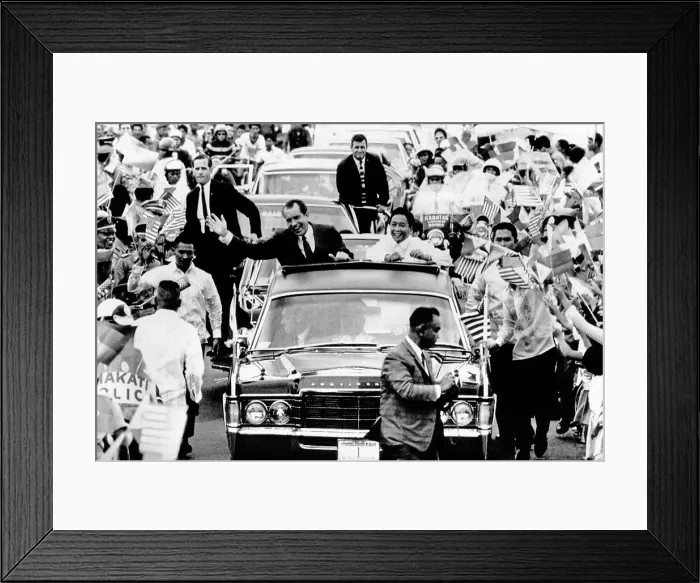 Framed Print : President Richard Nixon and Ferdinand Marcos during motorcade to Malacanang Palace in Manila. The Philippines was the first stop of Nixon's seven nation world tour